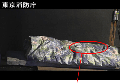 布団の上に観賞魚用ヒータを置いた状況